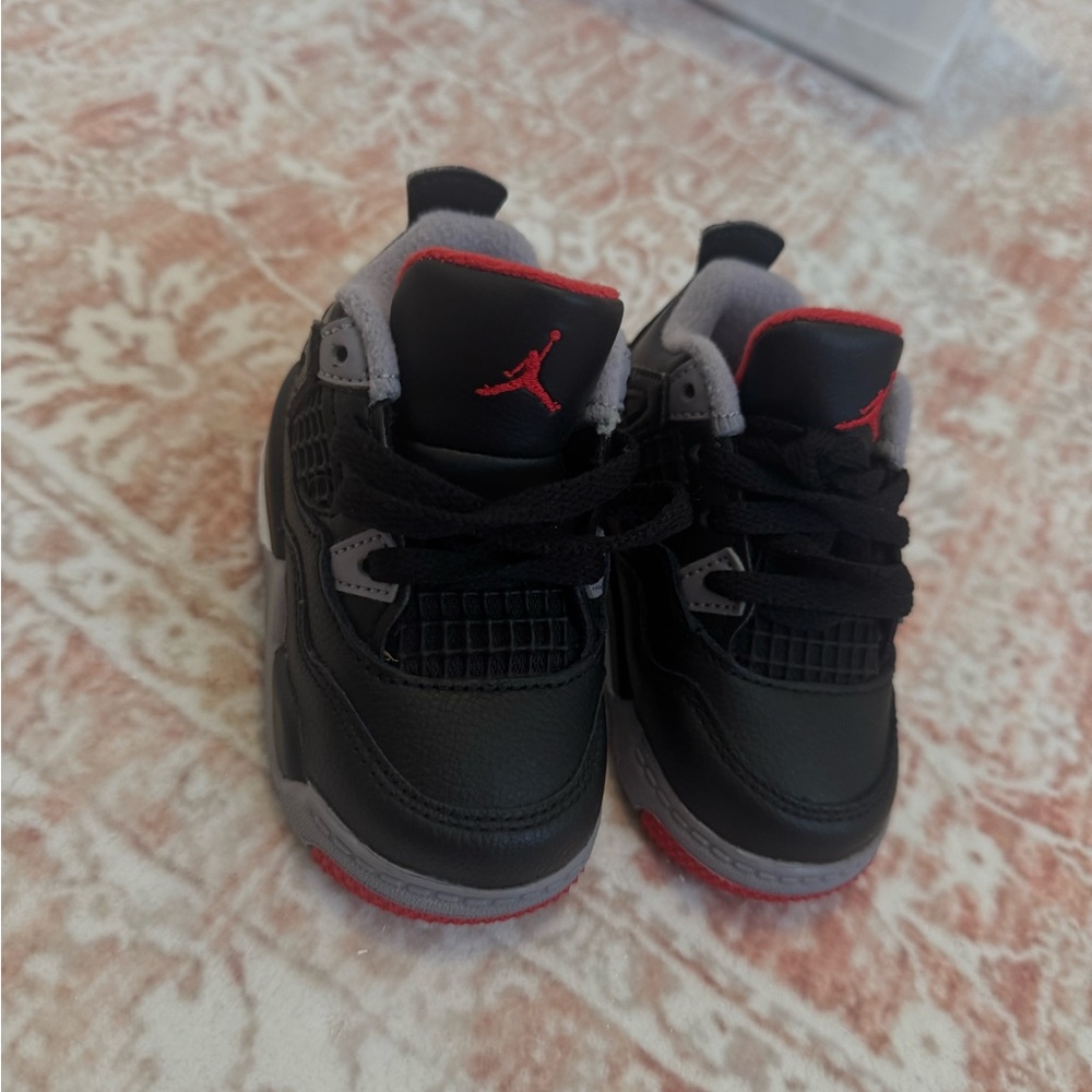Jordan Kids Black and Gray Sneakers with Red Accents